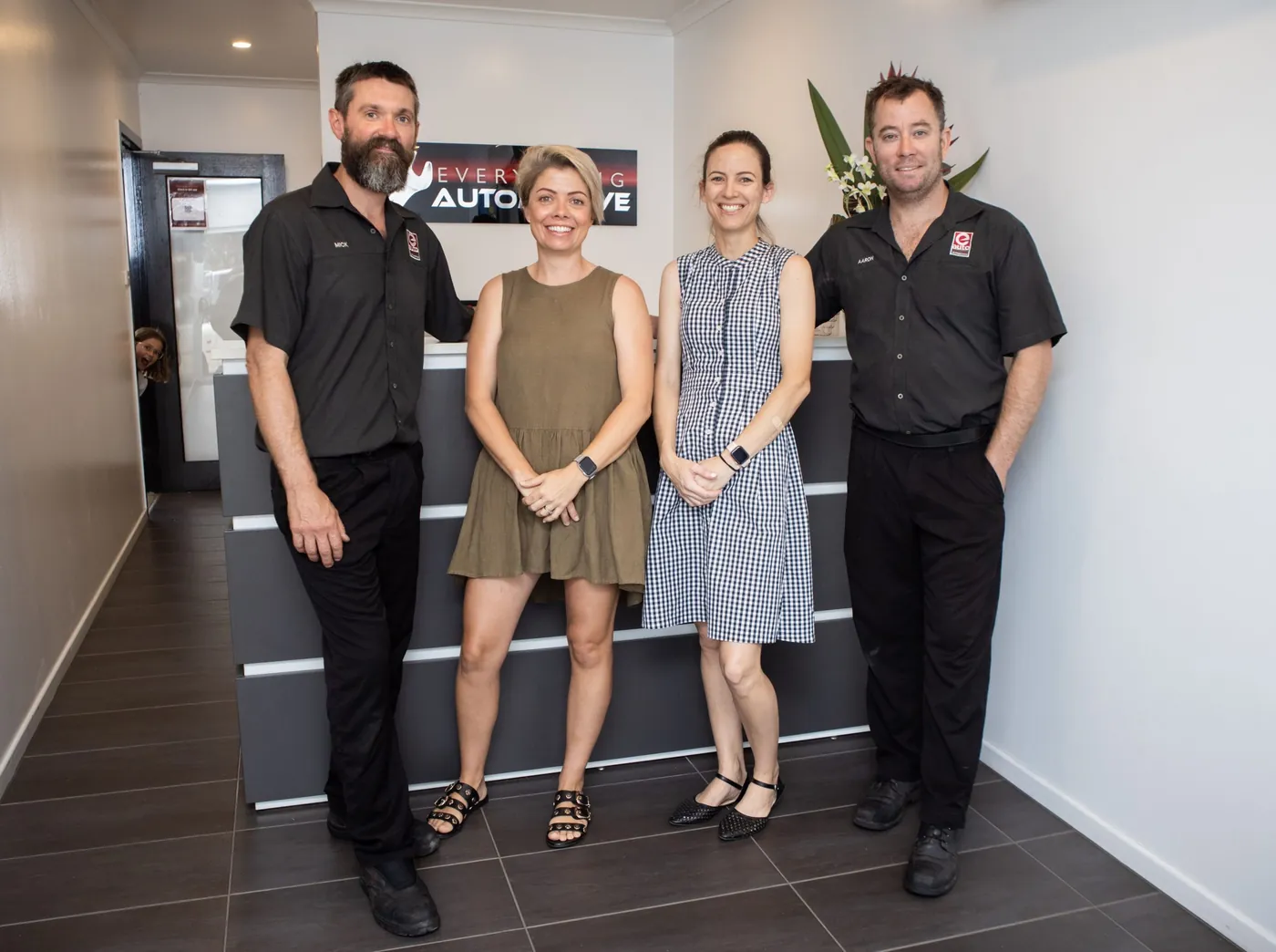 Members of the Everything Automotive team in the customer reception