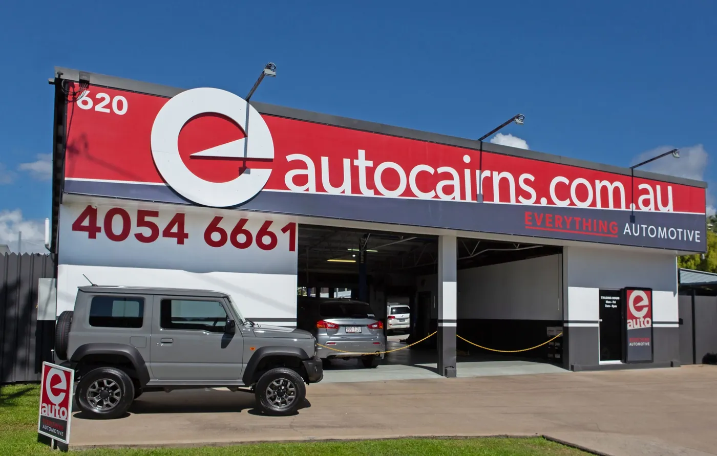 The Everything Automotive workshop at 620 Bruce Highway, Woree, with its red signage and open hoist bays